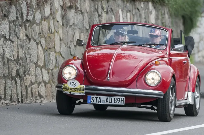 Framed Print : Laterally offset frontal view of the red VW Beetle Convertible 1300 LS with start number 136 Framed Print : Laterally offset frontal view of the red VW Beetle Convertible 1300 LS with start number 136