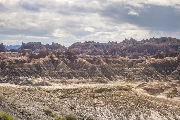 Framed Print : A layered rugged terrain rock formations of the preserve national park