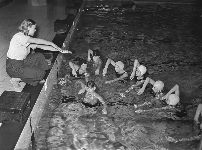 Framed Print : Learning how to swim in the 1940s