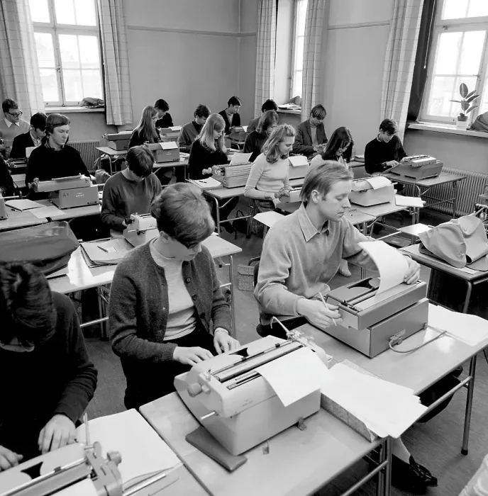 Framed Print : Learning to type in the 1960s. A classroom of students sitting at typewriters. A class and education in typing, using the right fingers and keys. 1968. Conard ref 5573