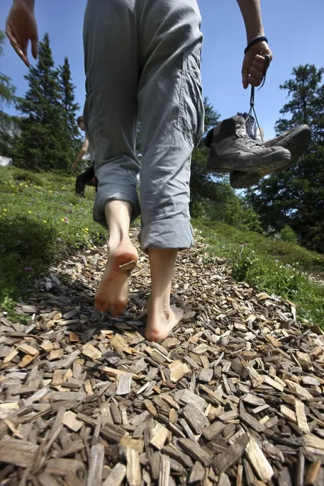 Framed Print : Legs of a barefoot hiker, adventure hiking trail
