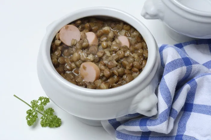 Framed Print : Lentil (Lens culinaris) dish with sausage slices in a bowl