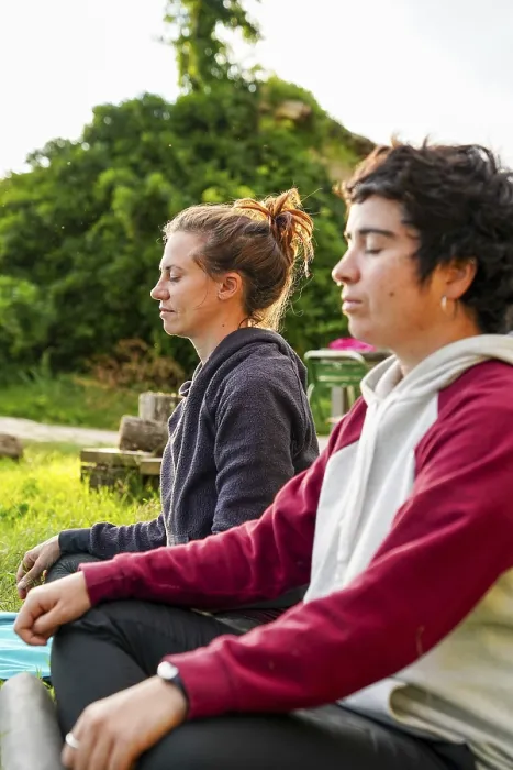Framed Print : Lesbian couple meditates peacefully outdoors while camping in a motorhome Serene moment showcasing relaxation