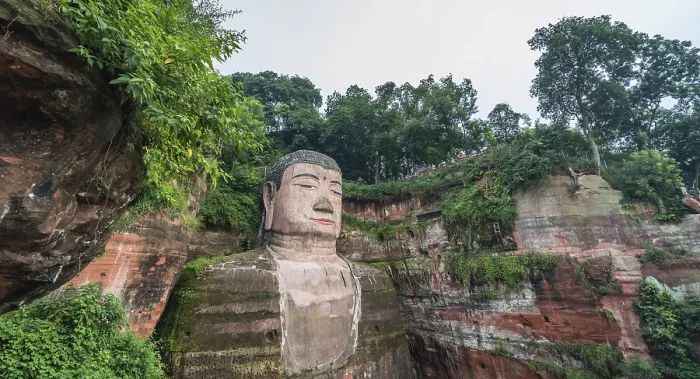 Framed Print : Leshan, China - July 2019 : The close up of the head and torso of the Giant Leshan Buddha