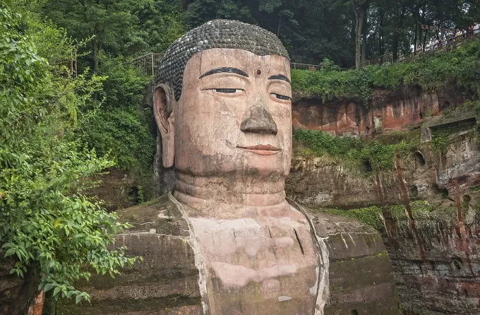 Framed Print : Leshan, China - July 2019 : The close up of the head and torso of the Giant Leshan Buddha