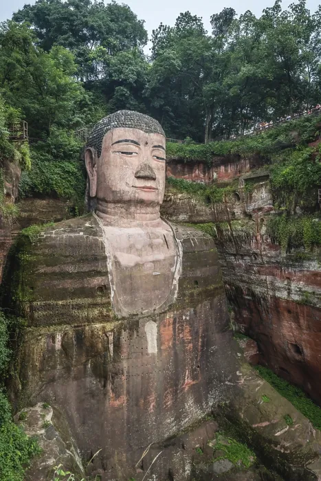 Framed Print : Leshan, China - July 2019 : The close up of the head and torso of the Giant Leshan Buddha