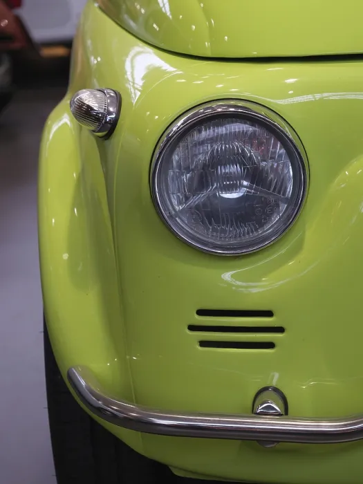 Framed Print : Detail of a light green vintage car with distinctive headlights Framed Print : Detail of a light green vintage car with distinctive headlights