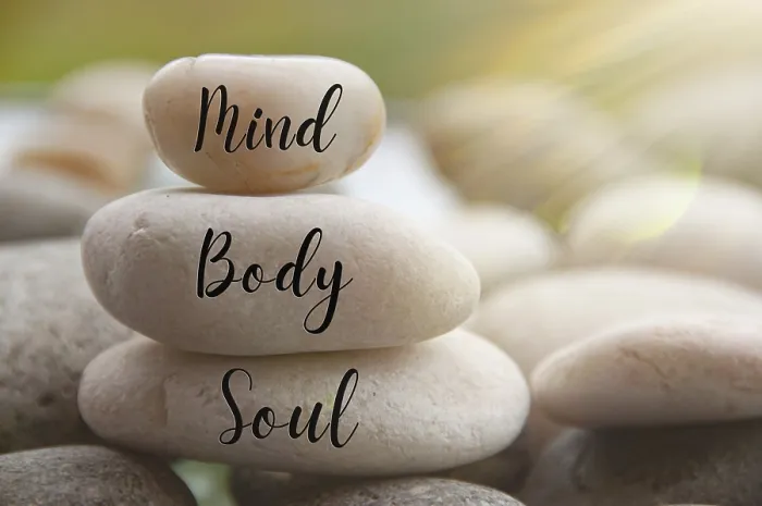 Framed Print : Light shining on zen stones with words Mind