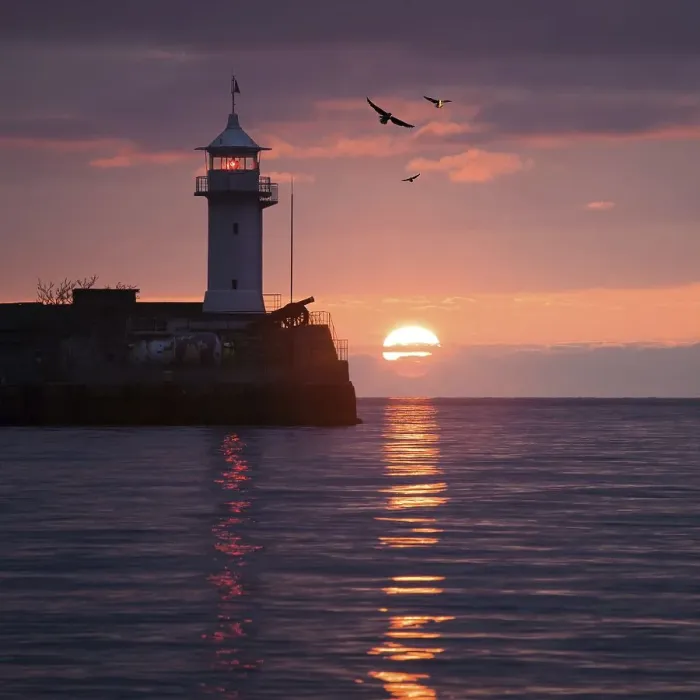 Framed Print : Lighthouse on sunrise. Yalta, Crimea