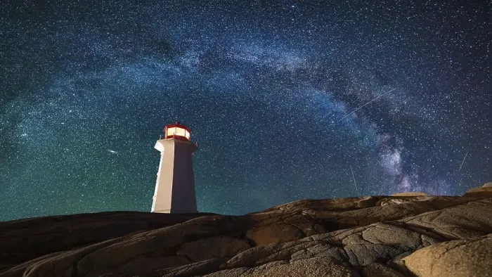 Framed Print : Lighthouse surrounded by rocks at night Framed Print : Lighthouse surrounded by rocks at night