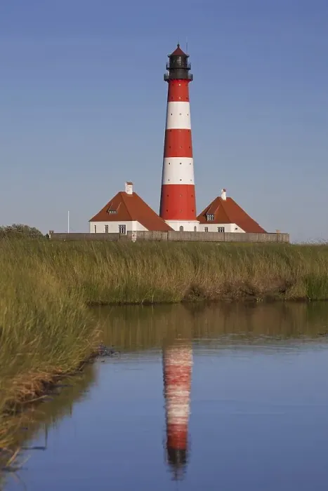Framed Print : Lighthouse Westerheversand at Westerhever on the Eiderstedt Peninsula Framed Print : Lighthouse Westerheversand at Westerhever on the Eiderstedt Peninsula