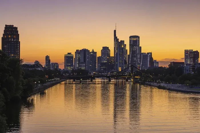 Framed Print : The lights of Frankfurt's banking skyline begin to glow in the evening after sunset