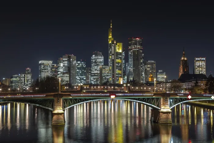 Framed Print : The lights of Frankfurt's banking skyline glow in the evening