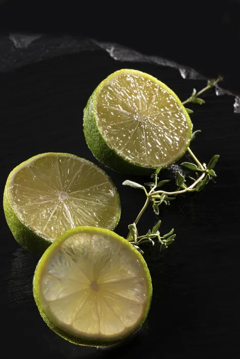 Framed Print : Three lime slices on a black stone plate Framed Print : Three lime slices on a black stone plate