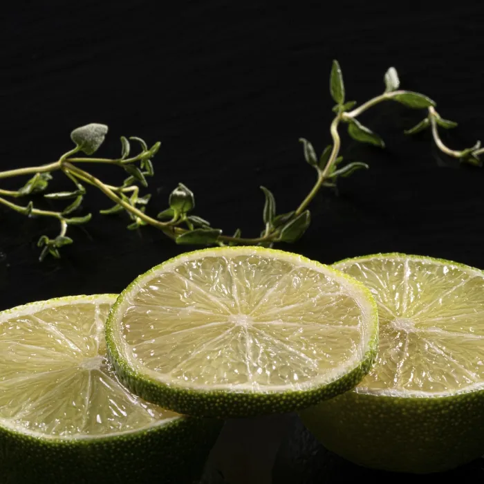 Framed Print : Three lime slices with green decoration