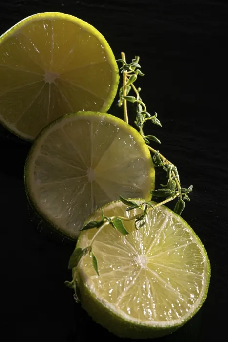 Framed Print : Three lime slices with green decoration