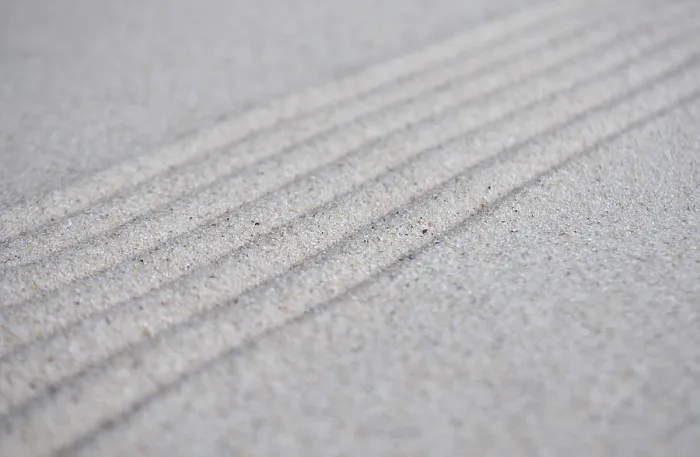 Framed Print : Lines formation on beach sand with customizable space for text