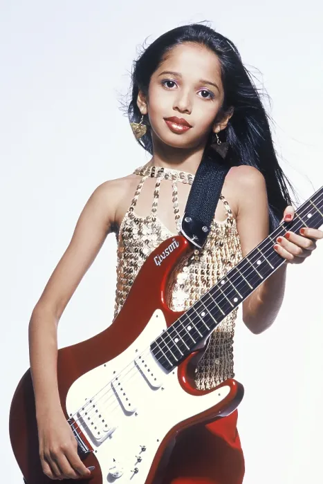 Framed Print : Little girl playing guitar