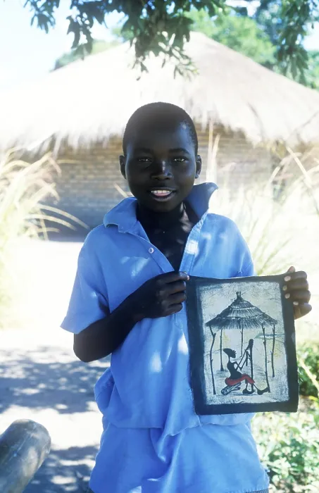 Framed Print : Local boy showing homemade artwork