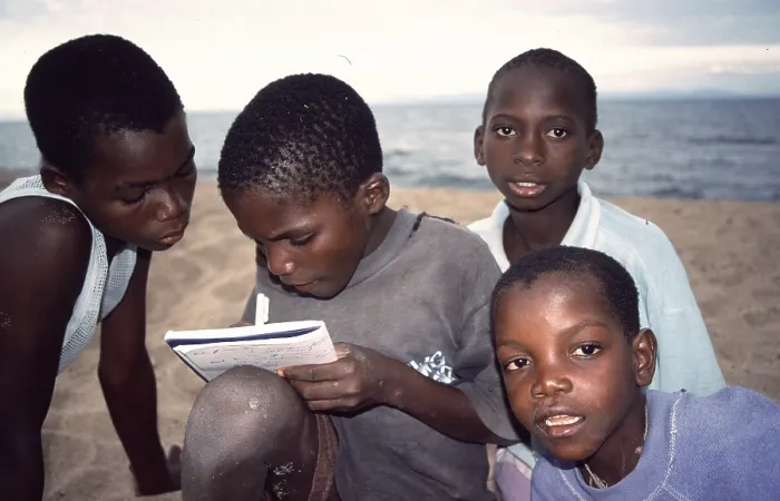 Framed Print : Local boys write down their addresses Framed Print : Local boys write down their addresses