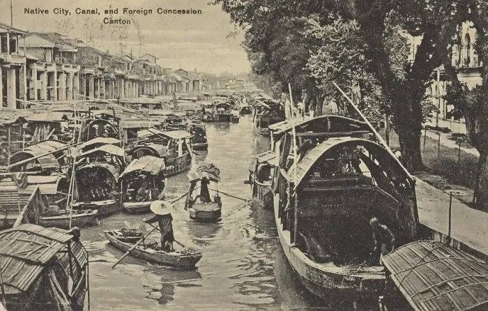 Framed Print : Local workers in the city, canal with many boats and foreign concession