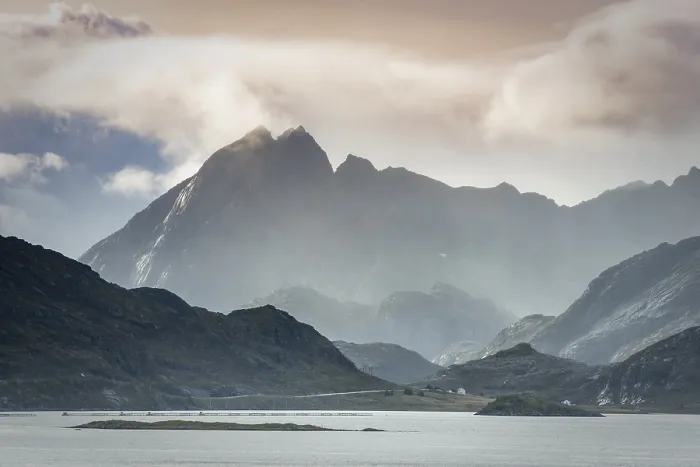 Framed Print : Lofoten mountains in haze and clouds by the fjord Framed Print : Lofoten mountains in haze and clouds by the fjord