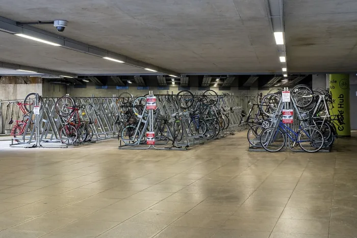 Framed Print : London, United Kingdom - 16 May 2025: Bicycle storage area near London Bridge showing rows of bikes and metal racks
