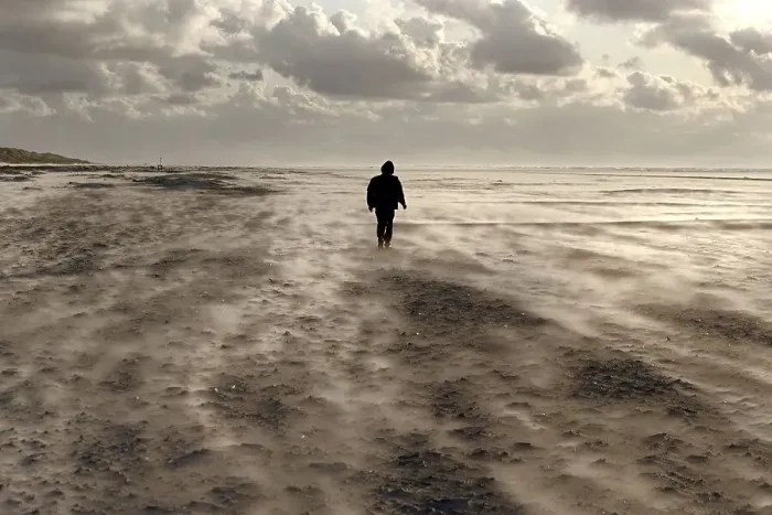 Framed Print : Lone figure of a person on a windy beach Framed Print : Lone figure of a person on a windy beach