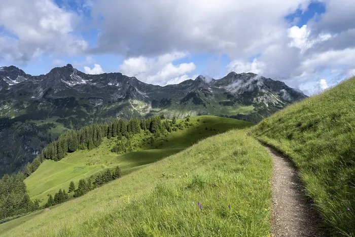 Framed Print : Lonely hiking trail, mountains behind Framed Print : Lonely hiking trail, mountains behind