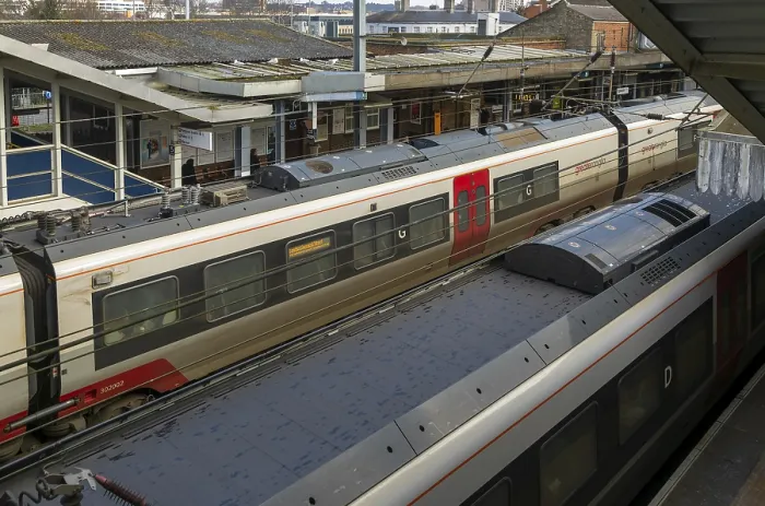 Framed Print : Looking down from above at Greater Anglia trains at platforms of Ipswich railway station