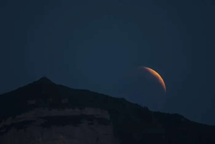 Framed Print : Lunar eclipse above the mountain station of Hohen Kasten