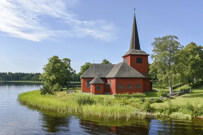 Framed Print : Lungsunds kyrka, church by a lake in Storfors