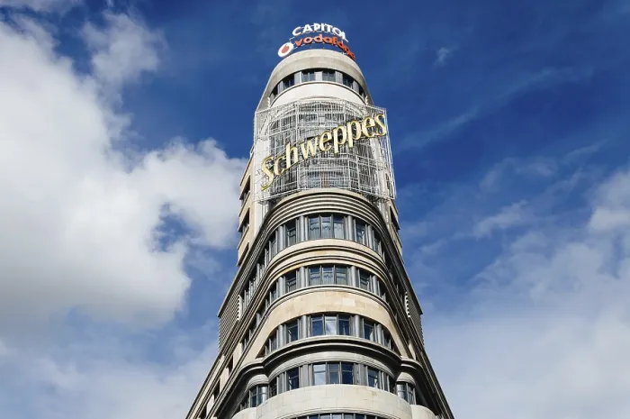 Framed Print : Madrid, Spain, September 18, 2016: Low angle view of Capitol building at Gran Via Street in Madrid Framed Print : Madrid, Spain, September 18, 2016: Low angle view of Capitol building at Gran Via Street in Madrid