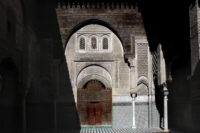 Framed Print : Magnificent Medersa Attarine architecture with ornate wooden doors and decorations