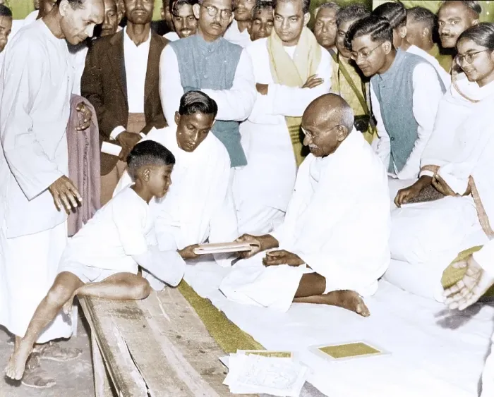 Framed Print : Mahatma Gandhi giving books to boy, India, Asia, 1946, Asia