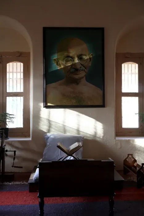 Framed Print : Mahatma Gandhi sitting place with his large photograph and his charkha at satyagraha As hram founded in 25-May-1915 at Kochrab Framed Print : Mahatma Gandhi sitting place with his large photograph and his charkha at satyagraha As hram founded in 25-May-1915 at Kochrab