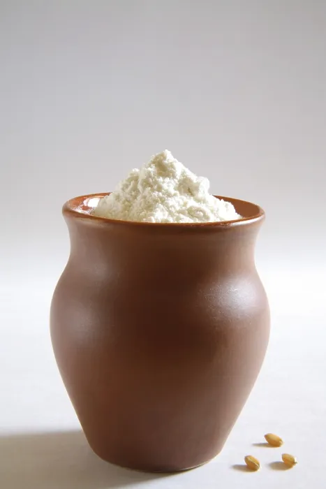 Framed Print : Maida, wheat flour in clay pot, India