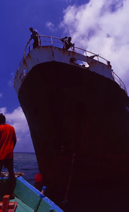 Framed Print : Maldives: Dhoni on the bow of a cargo ship Framed Print : Maldives: Dhoni on the bow of a cargo ship