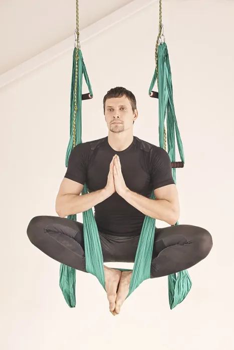 Framed Print : Male person do hammock yoga class exercise