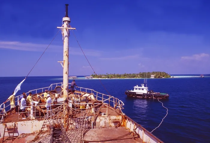 Framed Print : Male: A red freighter is sunk off Makafushi Island to form the basis for a coral reef