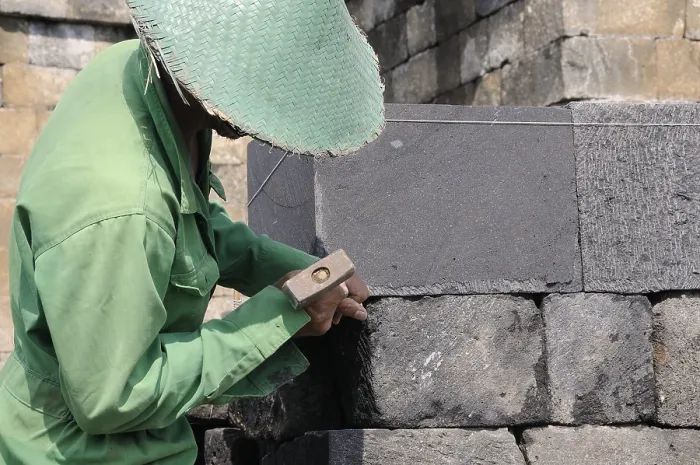 Framed Print : Man doing stonemasonry, restoration of the Borobudur temple