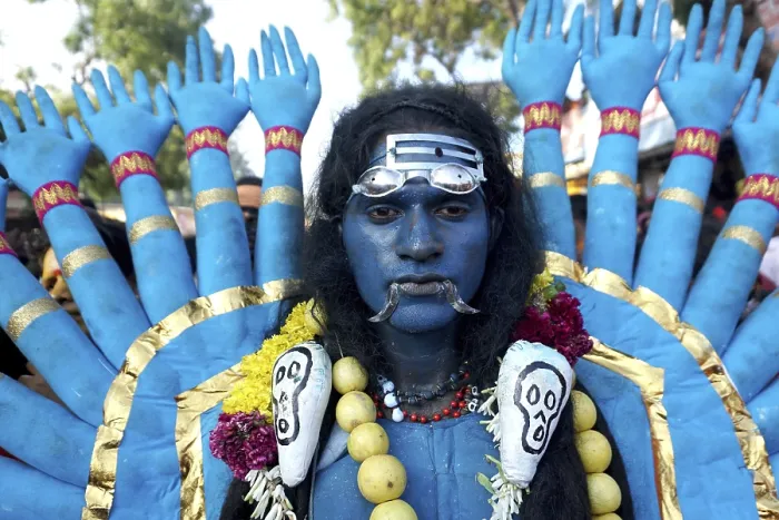 Framed Print : Man dress as Hindu Goddess Kali near Mutharamman temple