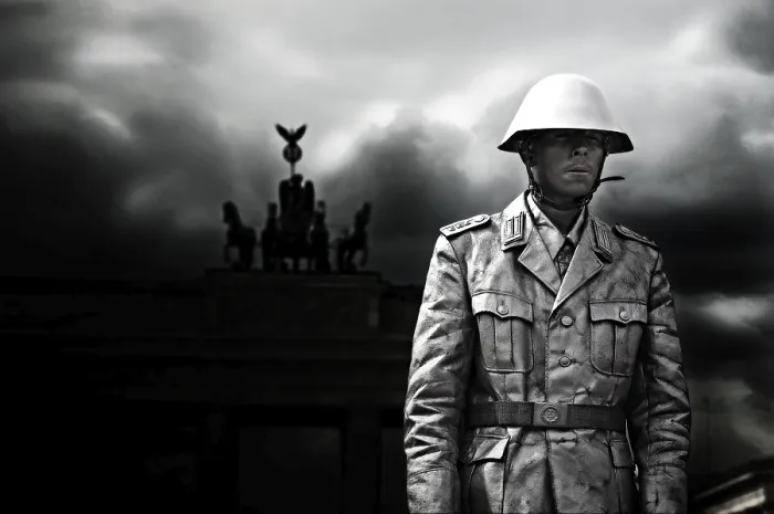 Framed Print : Man dressed as NVA soldier, in front of Brandenburger Gate