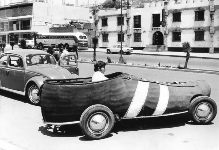 Framed Print : Man driving Car as a sneaker, Mexico City Framed Print : Man driving Car as a sneaker, Mexico City