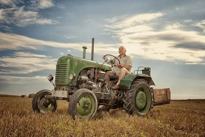 Framed Print : Man driving a Steyrer tractor, 15km / h