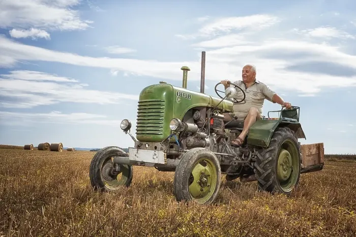 Framed Print : Man driving a Steyrer tractor, 15km / h Framed Print : Man driving a Steyrer tractor, 15km / h