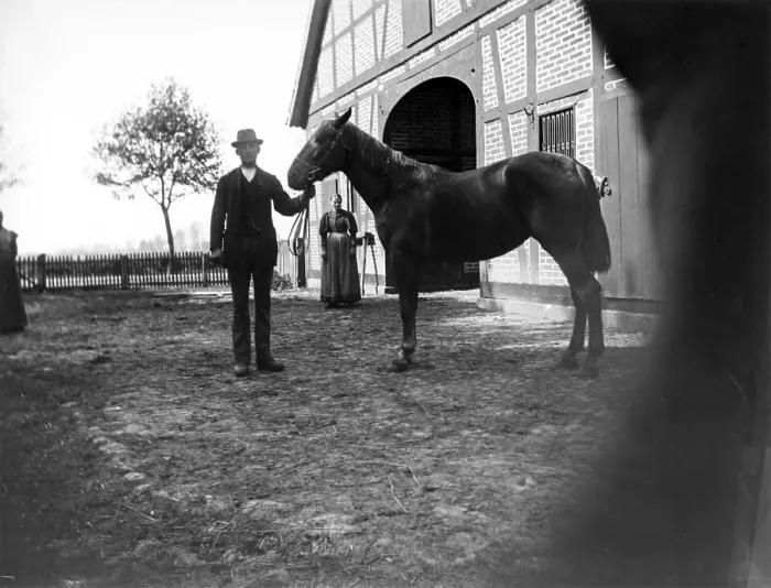 Framed Print : Man with horse posing for the photo