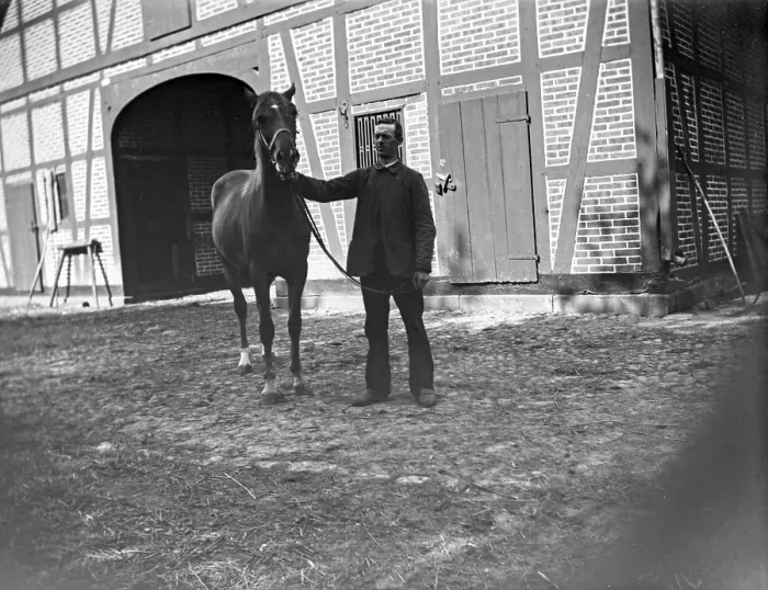 Framed Print : Man with horse posing for the photo