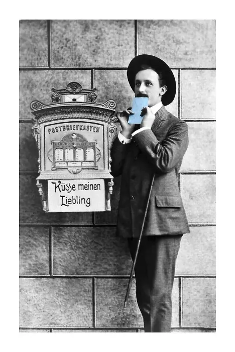 Framed Print : Man kissing a light blue love letter in front of a mailbox