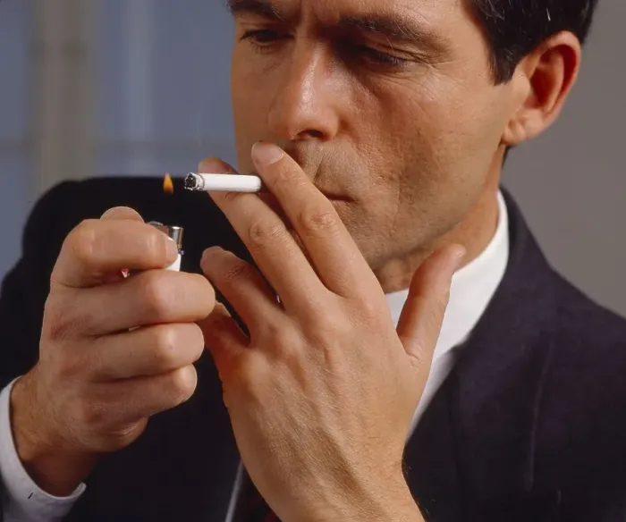 Framed Print : Man, light cigarettes and smoke